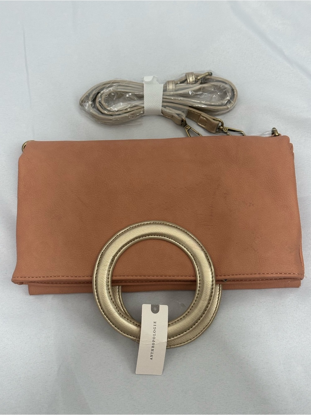 Anthropologie Peach Fold-Over Clutch with Gold Ring Detail and Strap